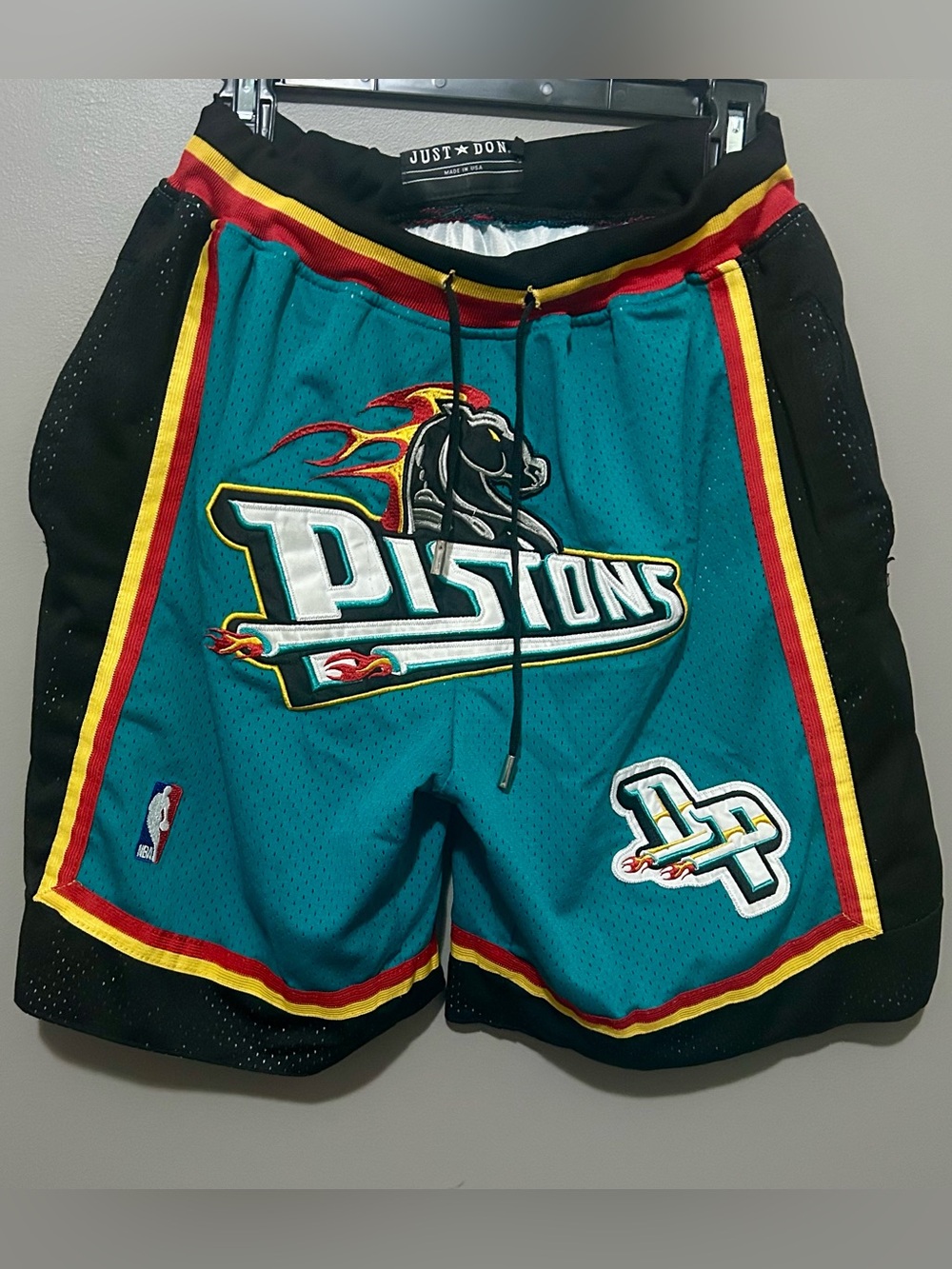 Just Don Teal Pistons Flame Logo Athletic Shorts with Red and Yellow Trim